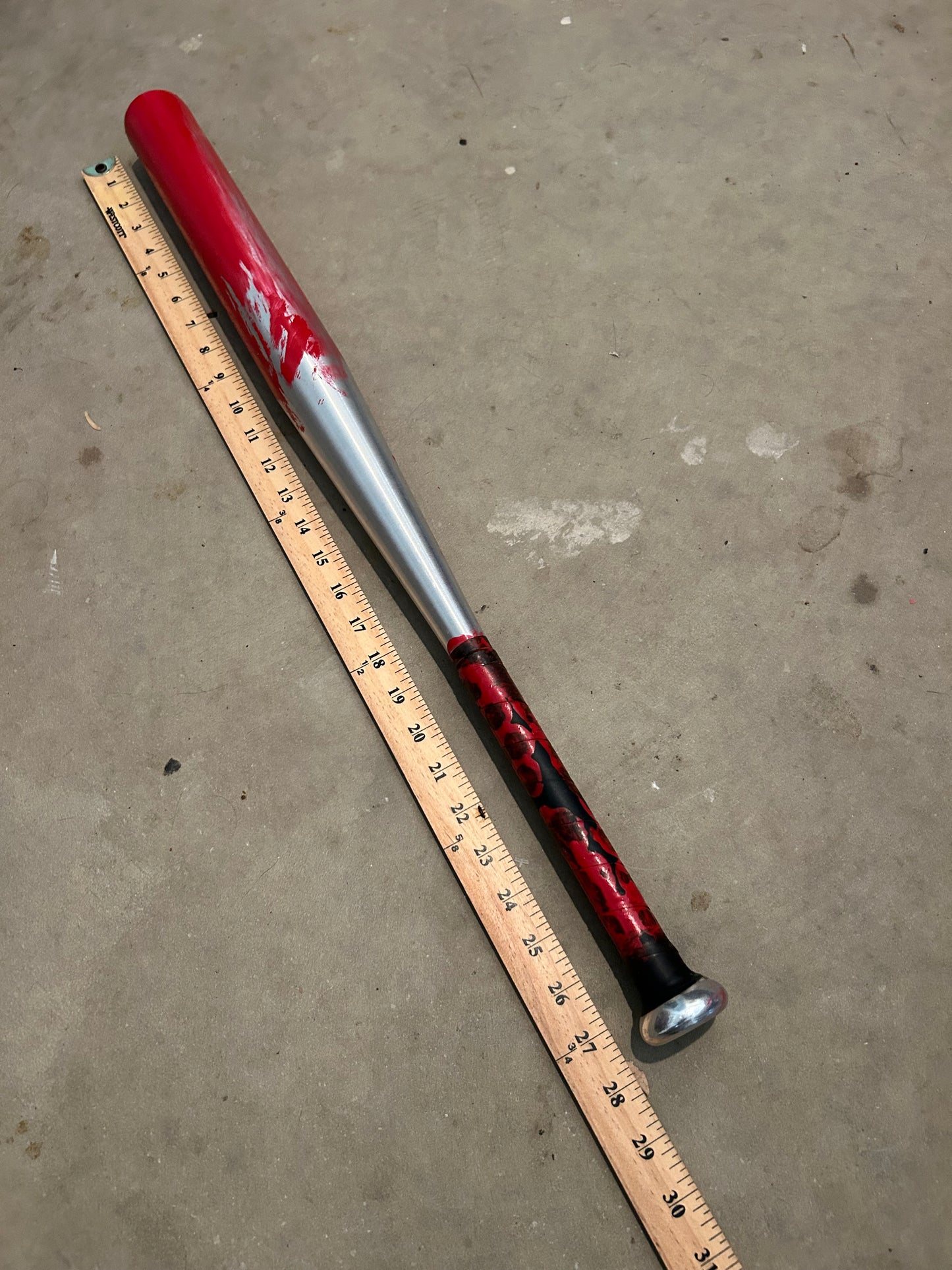 Horror-themed baseball bat - stage-safe aluminum with fake blood - 28 inches